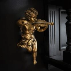 The Golden Cherub With Violin