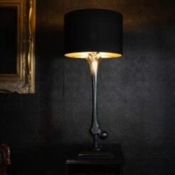 The Femur Bone Lamp By The Blackened Teeth