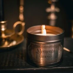 Memento Vivere Tin Candle -The Blackened Teeth Sales memento vivere tin candle scene