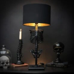 The Skeleton Lamp By The Blackened Teeth